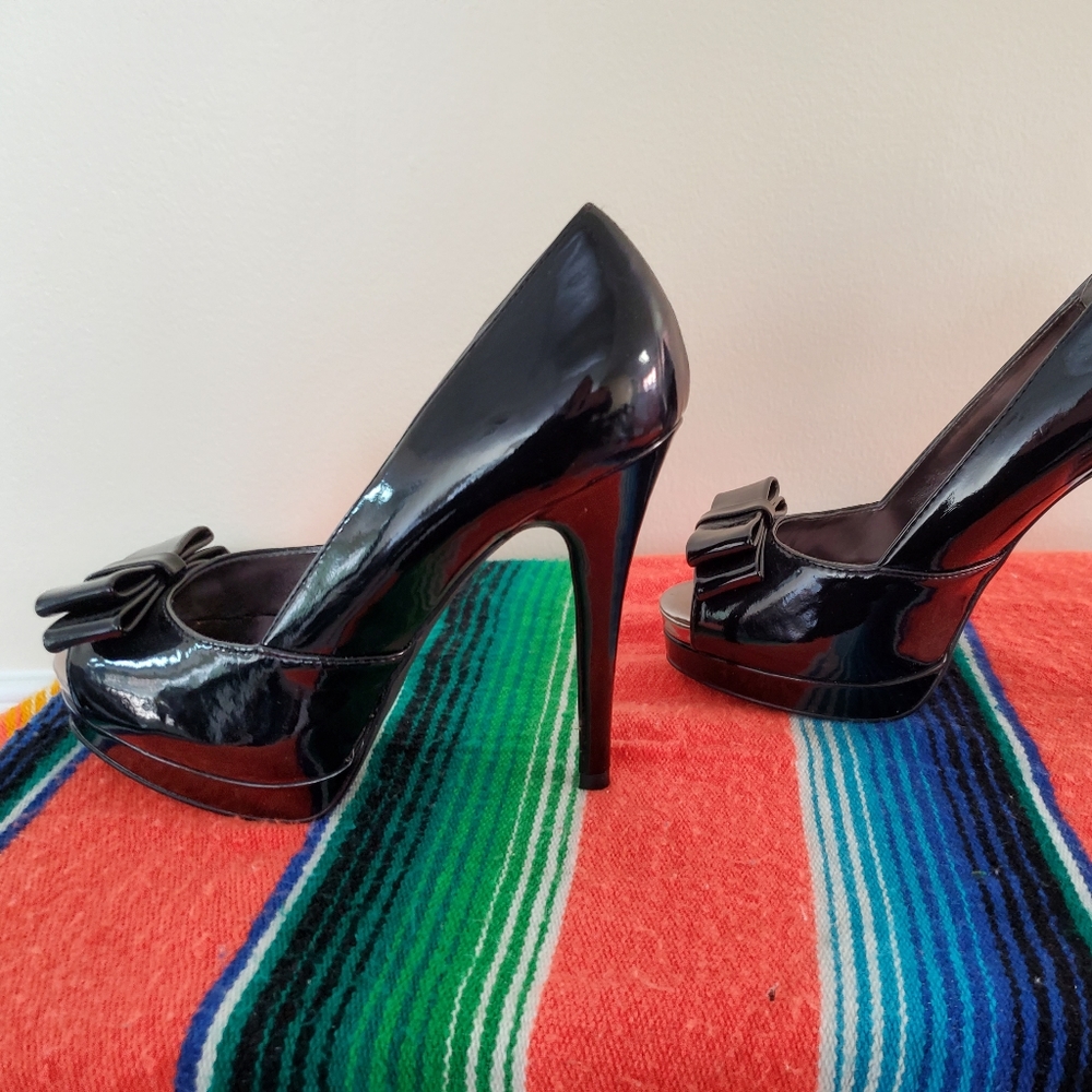 Guess black patent leather heels size 7.